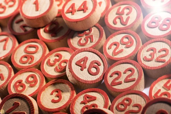 Round wooden bingo numbers background texture — Stock Photo, Image