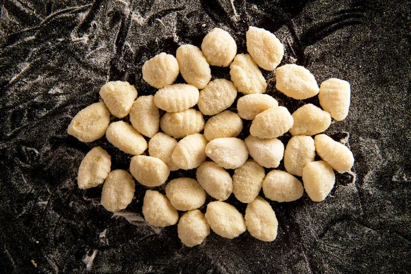 Uncooked Italian semolina dumplings — Stock Photo, Image
