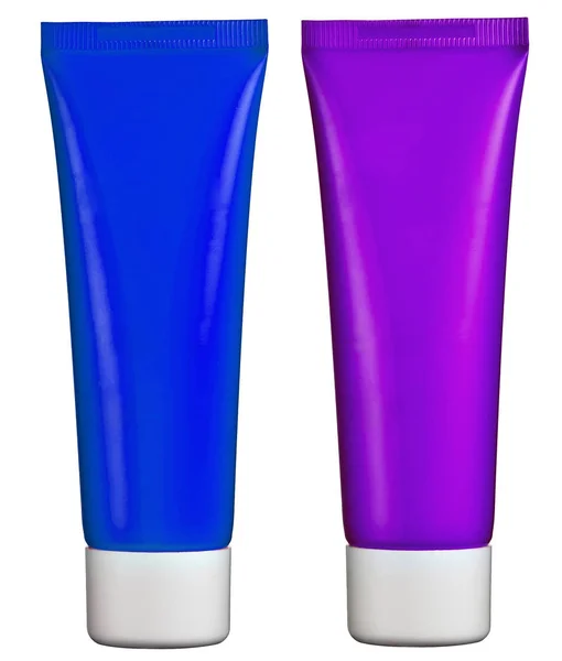 Close-up de dois tubos de loção em branco com espaço de cópia — Fotografia de Stock