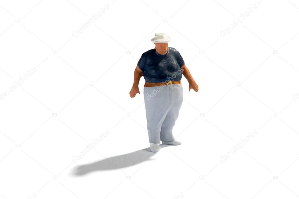 Miniature Fat Boy figure with shadow on white