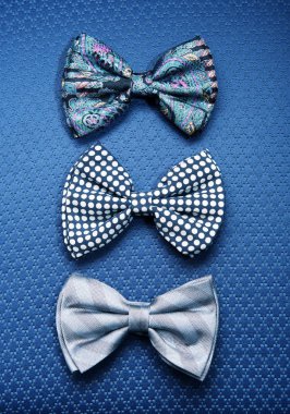 Üç papyon mavi Tekstil arka plan