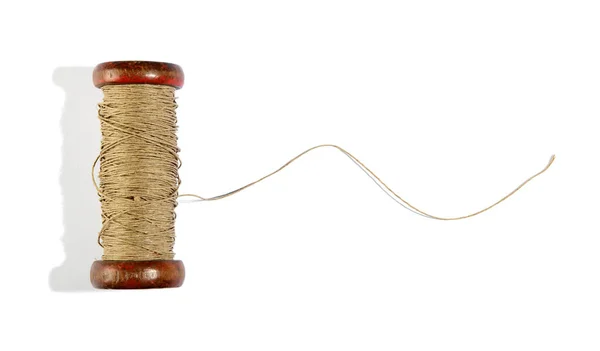 Wooden vintage reel of twine on white — Stock Photo, Image