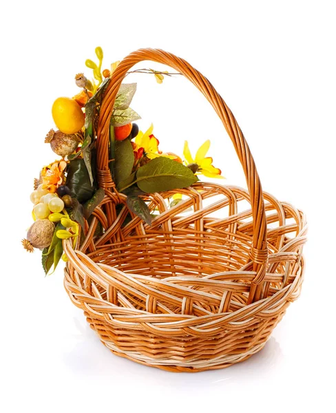 Basket decorated with fruit and flowers on a white background — Stock Photo, Image