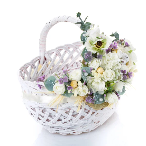 Decorated empty wicker basket on a white background — Stock Photo, Image