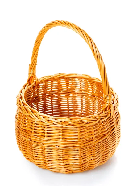 Wicker basket decorated on white — Stock Photo, Image