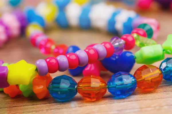 beaded necklace with a beautiful handcrafted wooden background