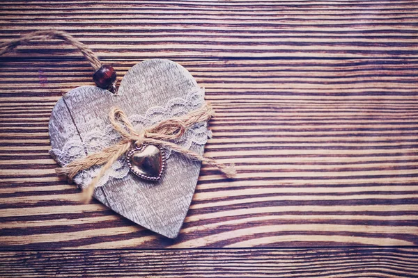 Valentine heart on wooden background Royalty Free Stock Images