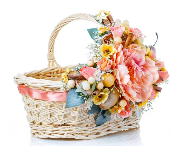 Basket decorated with flowers isolated on white — Stock Photo, Image