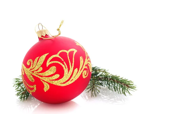 Red Christmas ball and fir branches . xmas decoration isolated — Stock Photo, Image