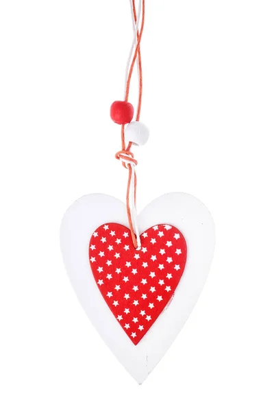 Vitt och rött sydde jul hjärtat på vit bakgrund, för hälsningar alla hjärtans dag — Stockfoto