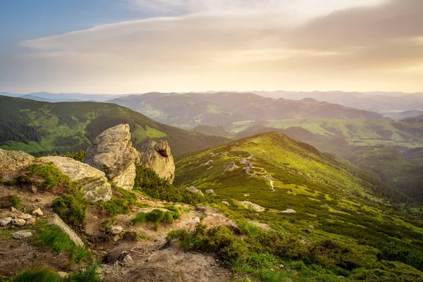 Rocks, mountains and forest at sunrise. HDR foto — Stock Photo, Image