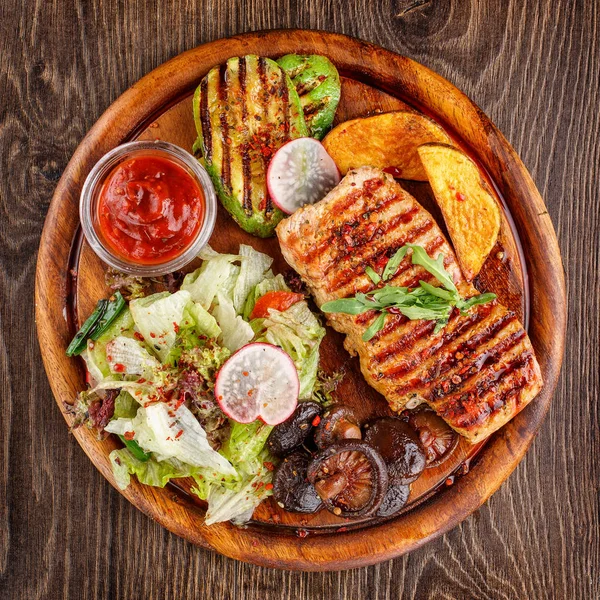 restaurant food - Chicken steak witht salad