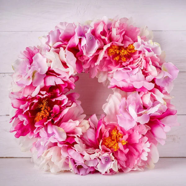 Flower decorative wreath for decorating the interior. Designer decoration for a door or a home. — Stock Photo, Image