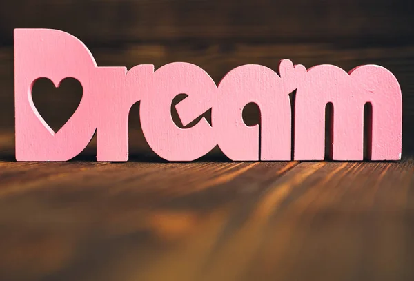 Dream text on wooden background — Stock Photo, Image
