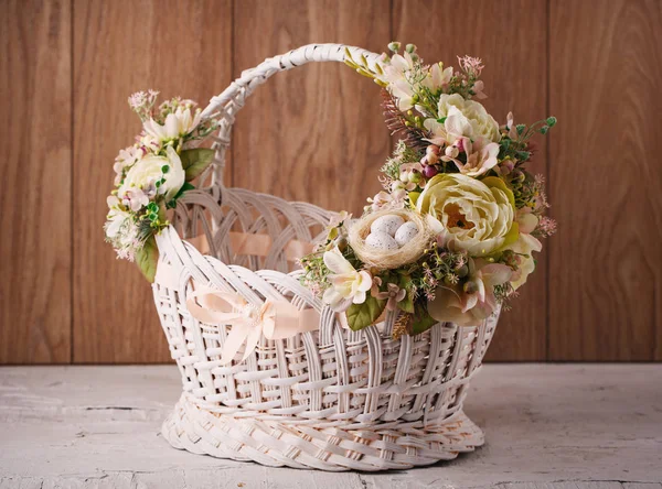 Decorative Easter basket with flowers — Stock Photo, Image