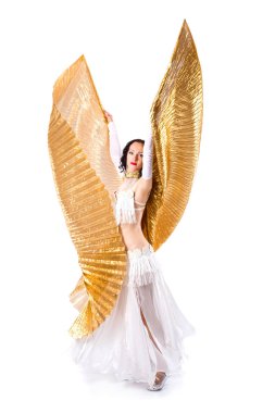 Güzel genç kız bir beyaz takım oryantal dans hareket