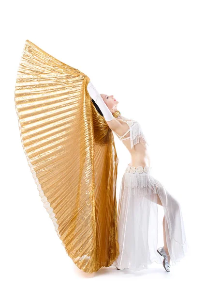 Vacker ung flicka i en vit kostym orientalisk dans i rörelse — Stockfoto