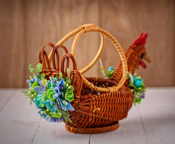 Wicker Designer Basket decorated with flower — Stock Photo, Image