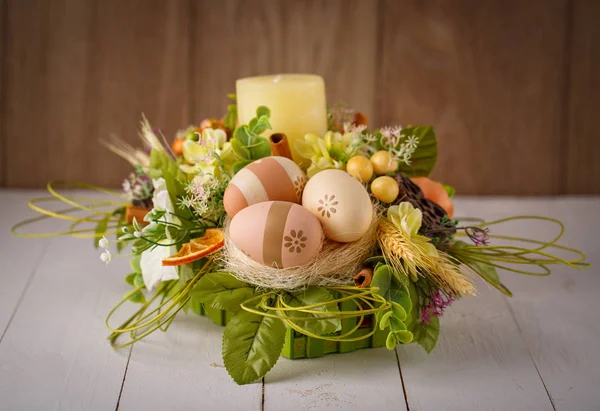 Decorated Easter candlestick with painted eggs with flowers — Stock Photo, Image