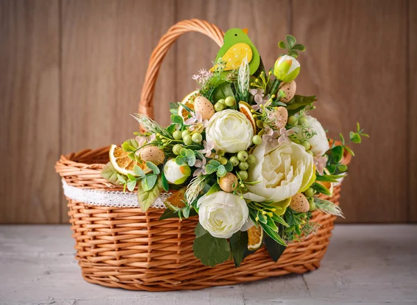 Decorative Easter basket with flowers — Stock Photo, Image