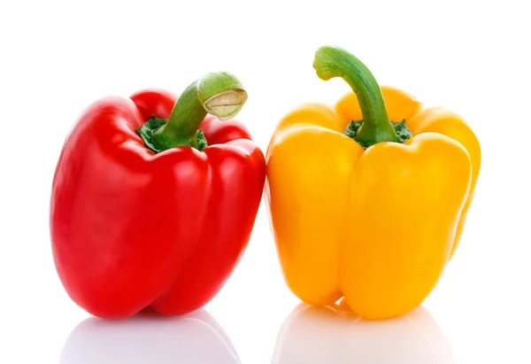 Red and yellow peppers isolated Stock Image