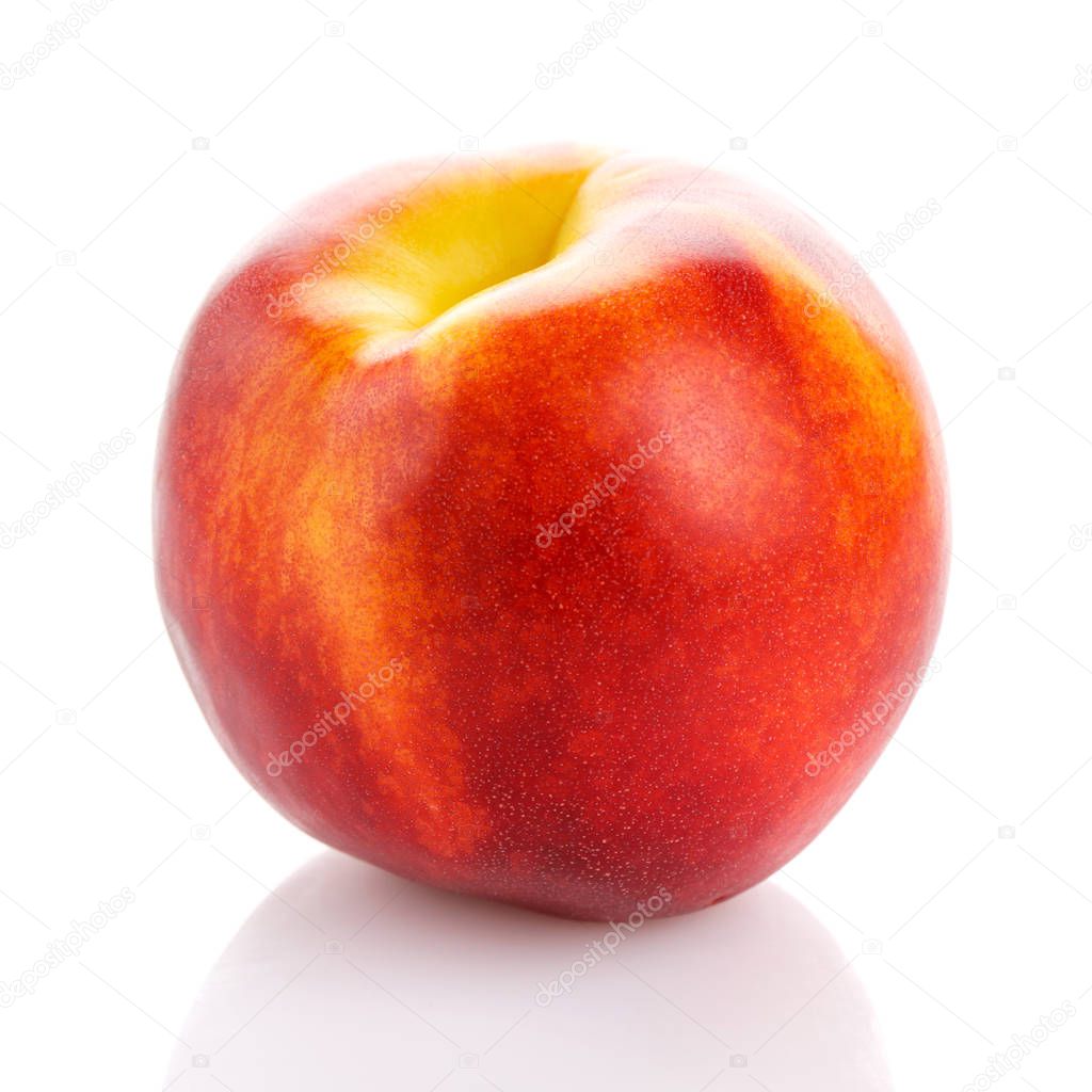 Single red peach fruit isolated on white background.