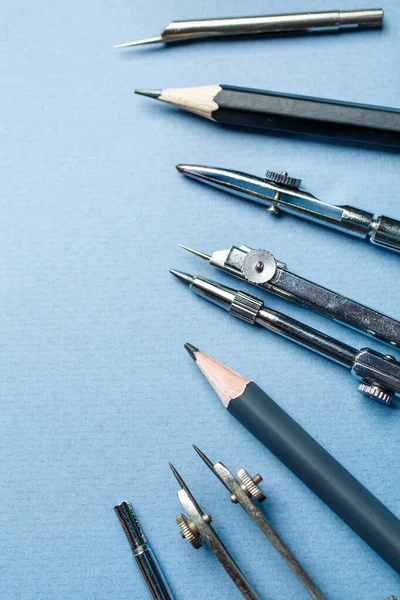 Drawing tools are arranged on a blue background — Stock Photo, Image
