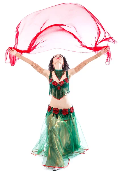 En kvinna i en grön klänning orientalisk dansare dansar erotisk dansare — Stockfoto