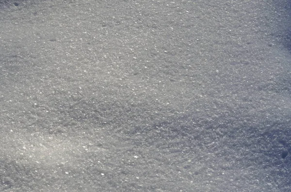 Textura de agua del nuevo copo de nieve sobre la vieja superficie nevada —  Fotos de Stock