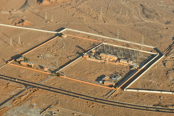 Power plant in the desert among the sands, top view