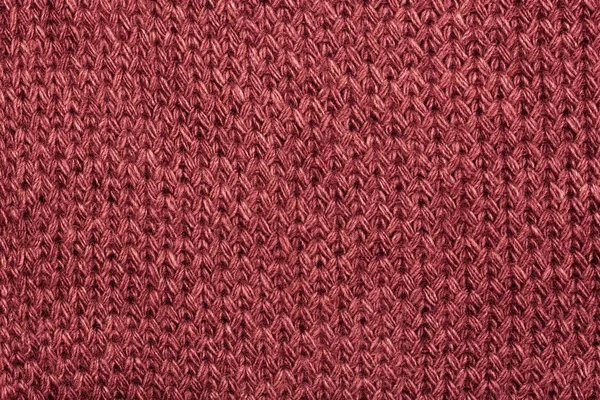 Knitted fabric textured background.