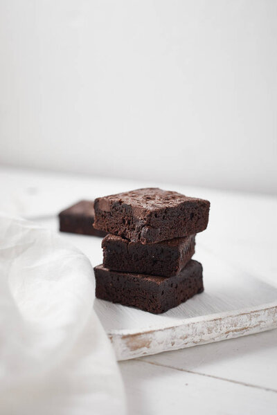 A piece of homemade chocolate brownies, sweet and dessert