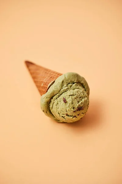 Green tea ice cream on pastel background.
