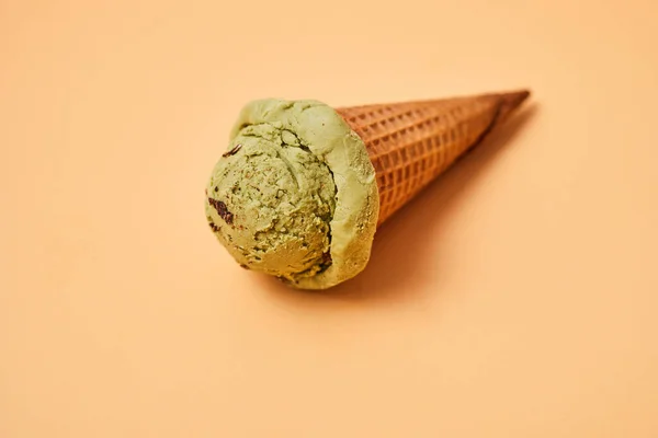 Green tea ice cream on pastel background.