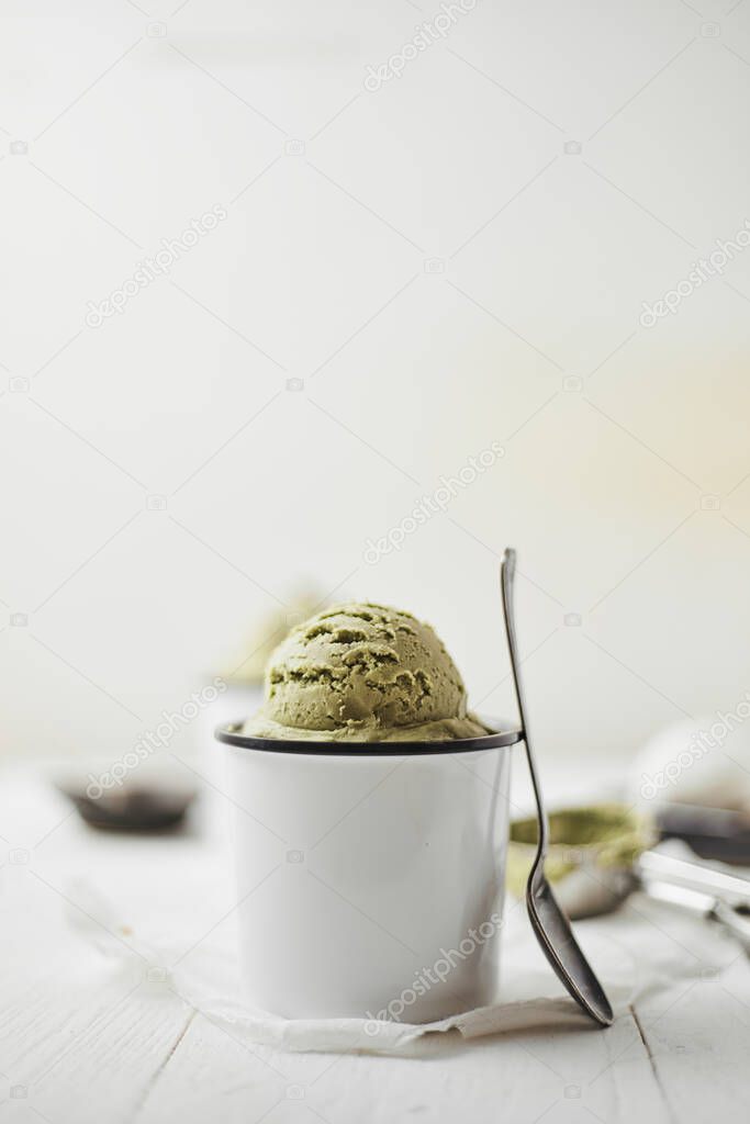 Green tea ice cream on white background