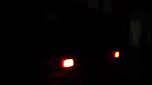 Flashing blue and red emergency lights of a fire truck at night. Close view — Stock Video