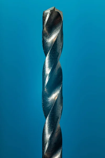 Drill Bit Close Up On Blue Background — Stock Photo, Image