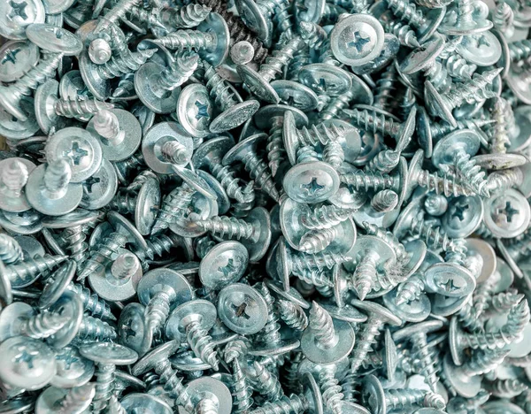 Background of many screws — Stock Photo, Image