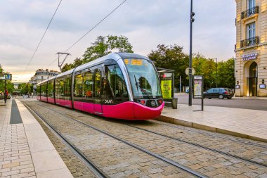 Pink Tram on railway in city at Dijon, France