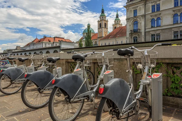 Ljubljana architecture and tourist bikes — Stock Photo, Image