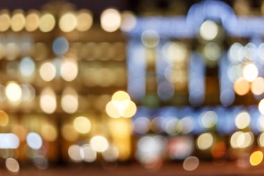 Şehir gece ışığının parlak renk tarzındaki bulanık bokeh arkaplanı.