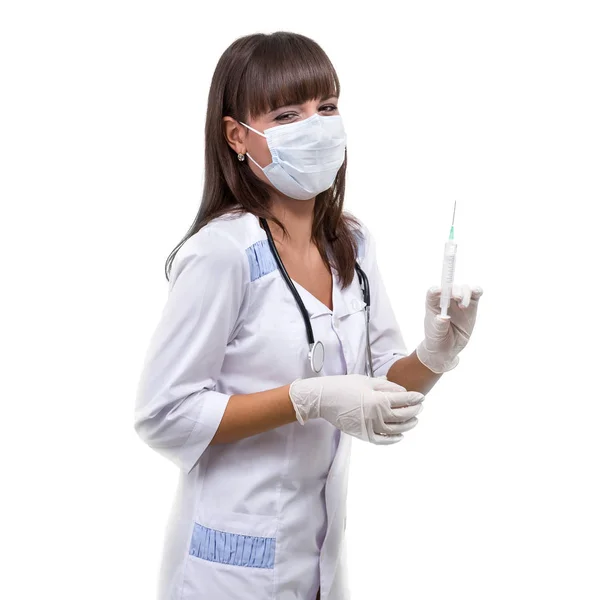 Young doctor woman with syringe against white background — Stock Photo, Image