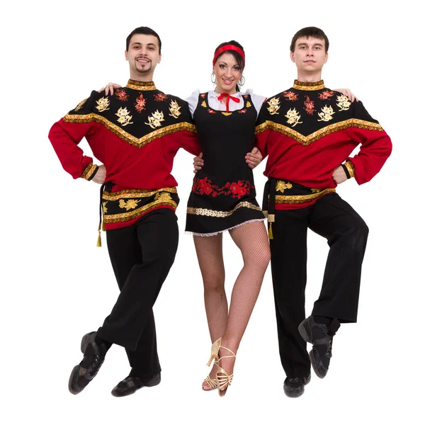 Two men and one woman wearing a folk russian costume posing — Stock Photo, Image