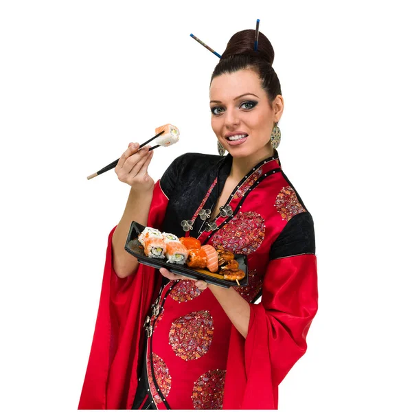 Mujer en vestido tradicional con comida oriental — Foto de Stock