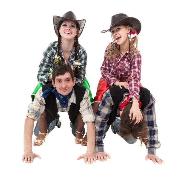 Equipe de dançarina de cabaré vestida com trajes de cowboy — Fotografia de Stock