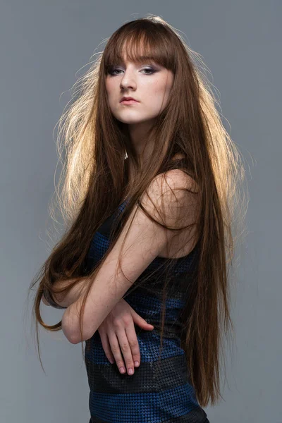 Closeup portrait of glamour young girl with beautiful long hair — Stock Photo, Image