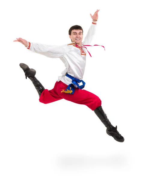 Young man wearing a folk costume jumping against isolated white with copyspace — Stock Photo, Image