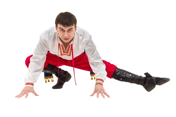 Young man wearing a folk costume posing against isolated white with copyspace Stock Image