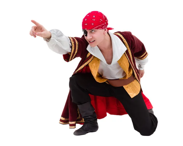 Man wearing a pirate costume posing with pointing gesture, isolated on white Royalty Free Stock Images