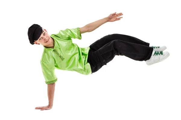 Joven con un disfraz folclórico bailando sobre un fondo blanco aislado con copyspace — Foto de Stock